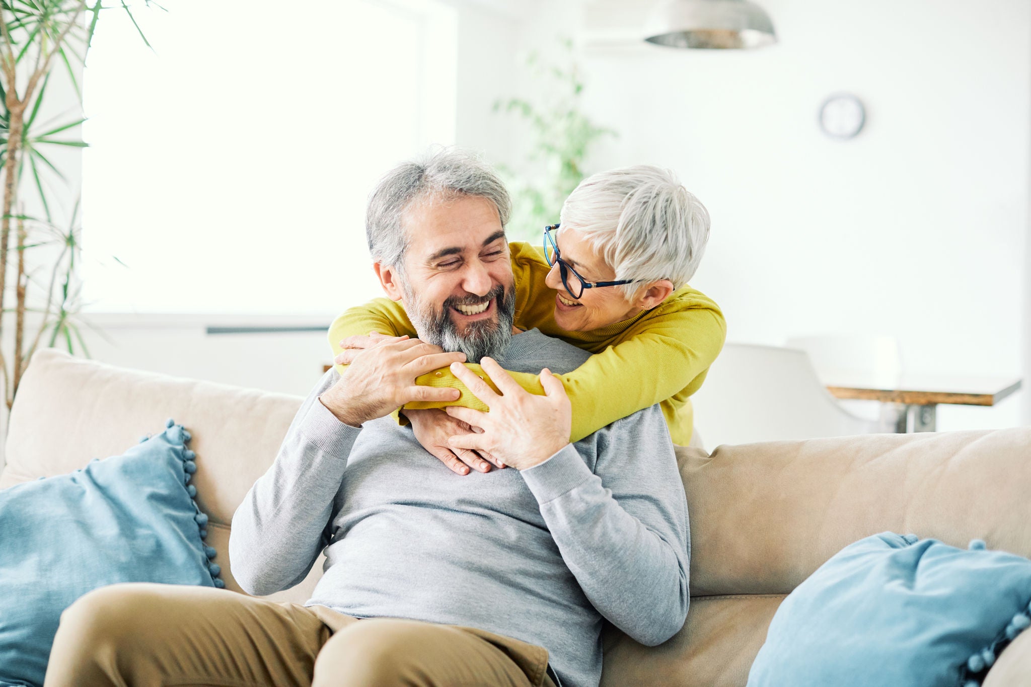 portrait of happy smiling senior couple at home