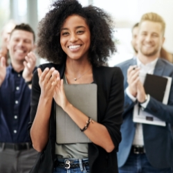 young black woman in group clapping